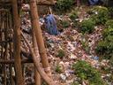 The area behind the shops along the hiking trail didnt look too good. We were left wondering if the stench of this garbage was the reason for the name -- the Perfume Pagoda.